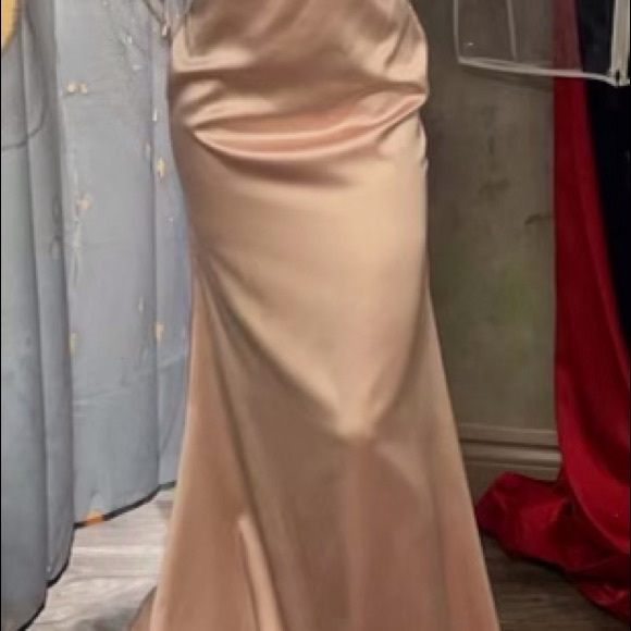 I have a beautiful size 8 brand new light pink satin prom dress. It is stunning! - Picture 5 of 8